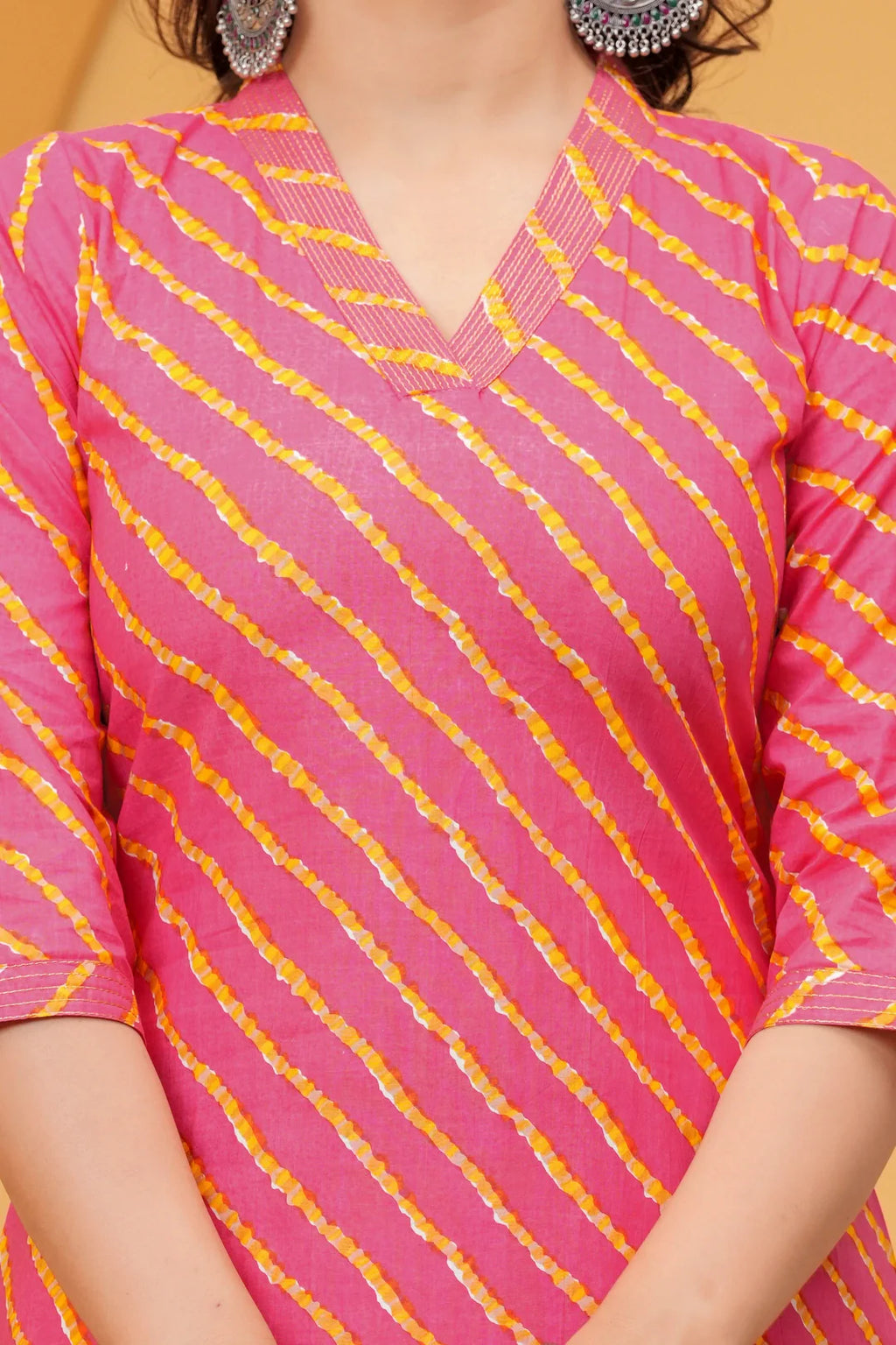 Pink Leheriya Printed Cotton Kurta with White Trousers